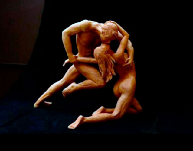 Los amantes, cerámica escultórica,  32 x 40 cm.	
